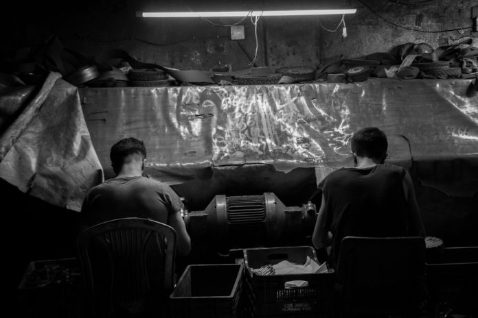 Pausa para la comida durante la jornada laboral en la era industrial